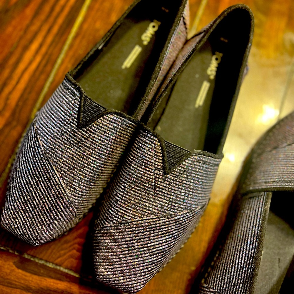 Toms Metallic Striped Slip-On Flats in Black and Silver